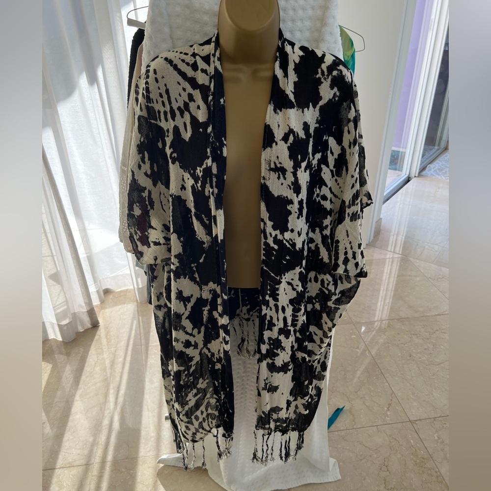 Lightweight cardigan. One size fits most. Coastal Cowgirl vibes.